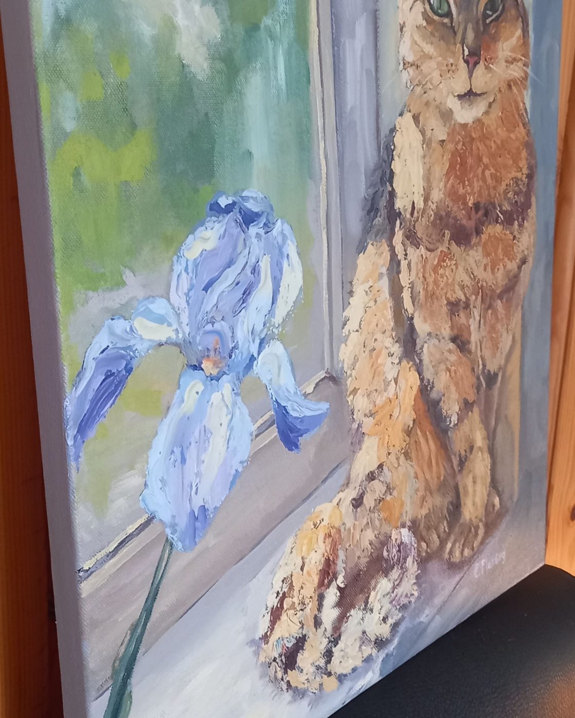 Side view of Cat with Blue Iris showing the painted surface.