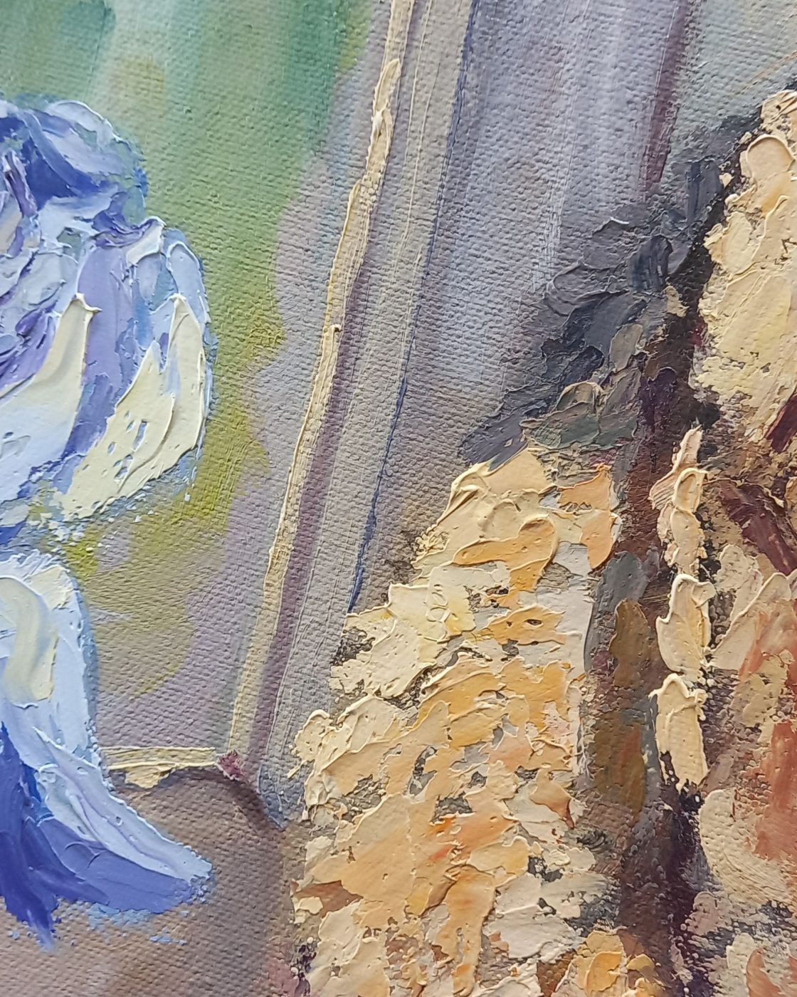 Detail of the iris and adjoining painted surface.